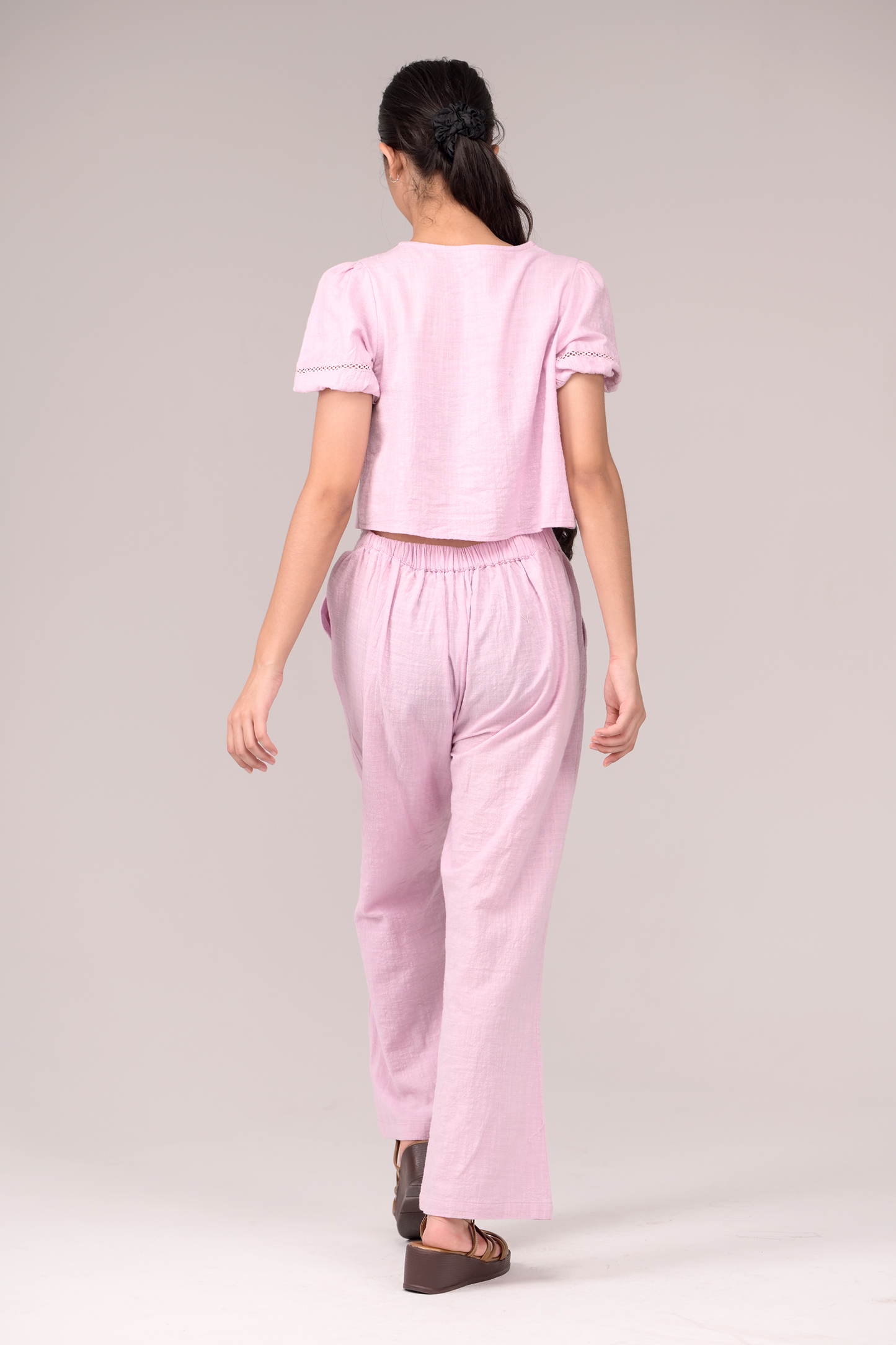 V‑neck top matched with snug waistband bottoms