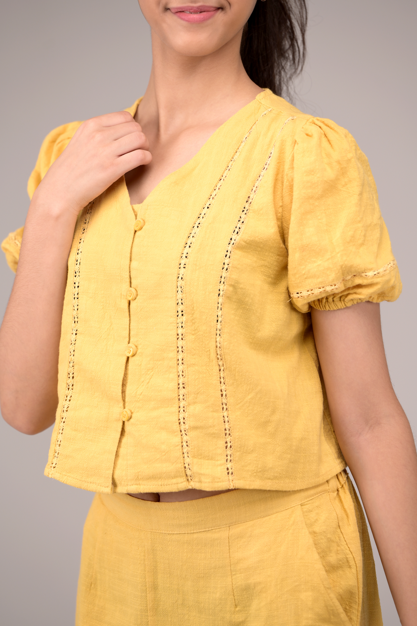 V‑neck top matched with snug waistband bottoms