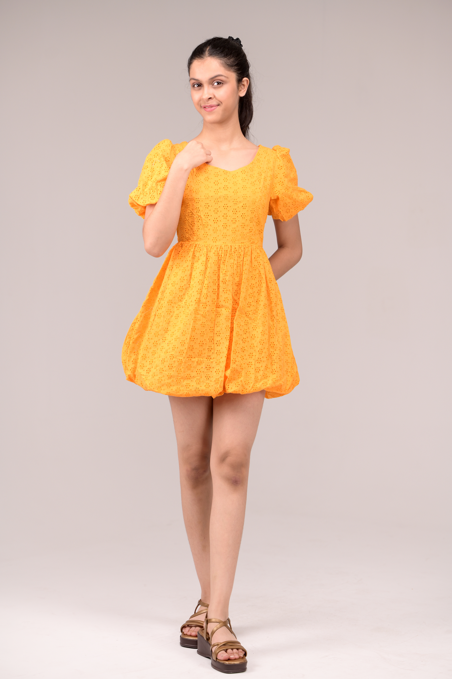 Dress with a fluttering ruffled neckline