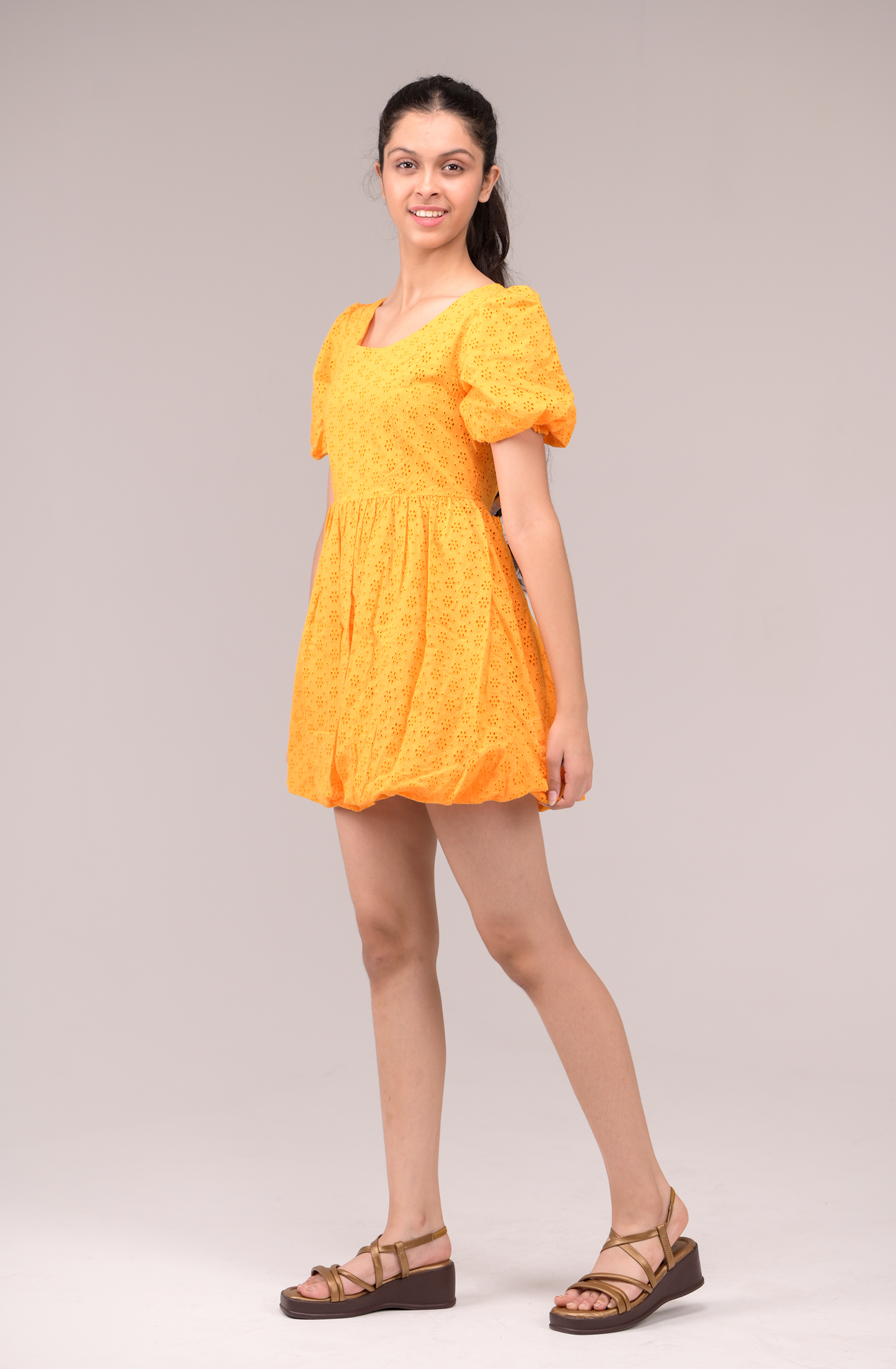 Dress with a fluttering ruffled neckline