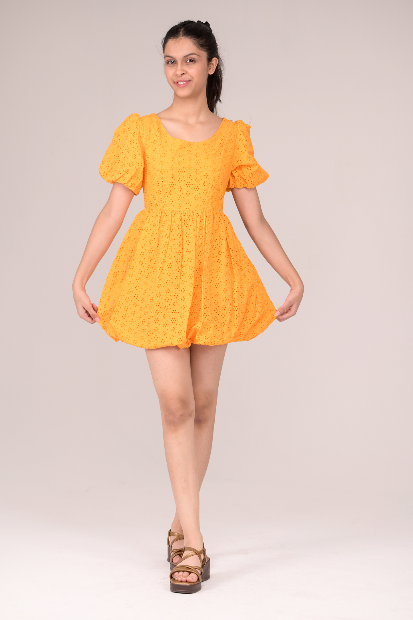 Dress with a fluttering ruffled neckline