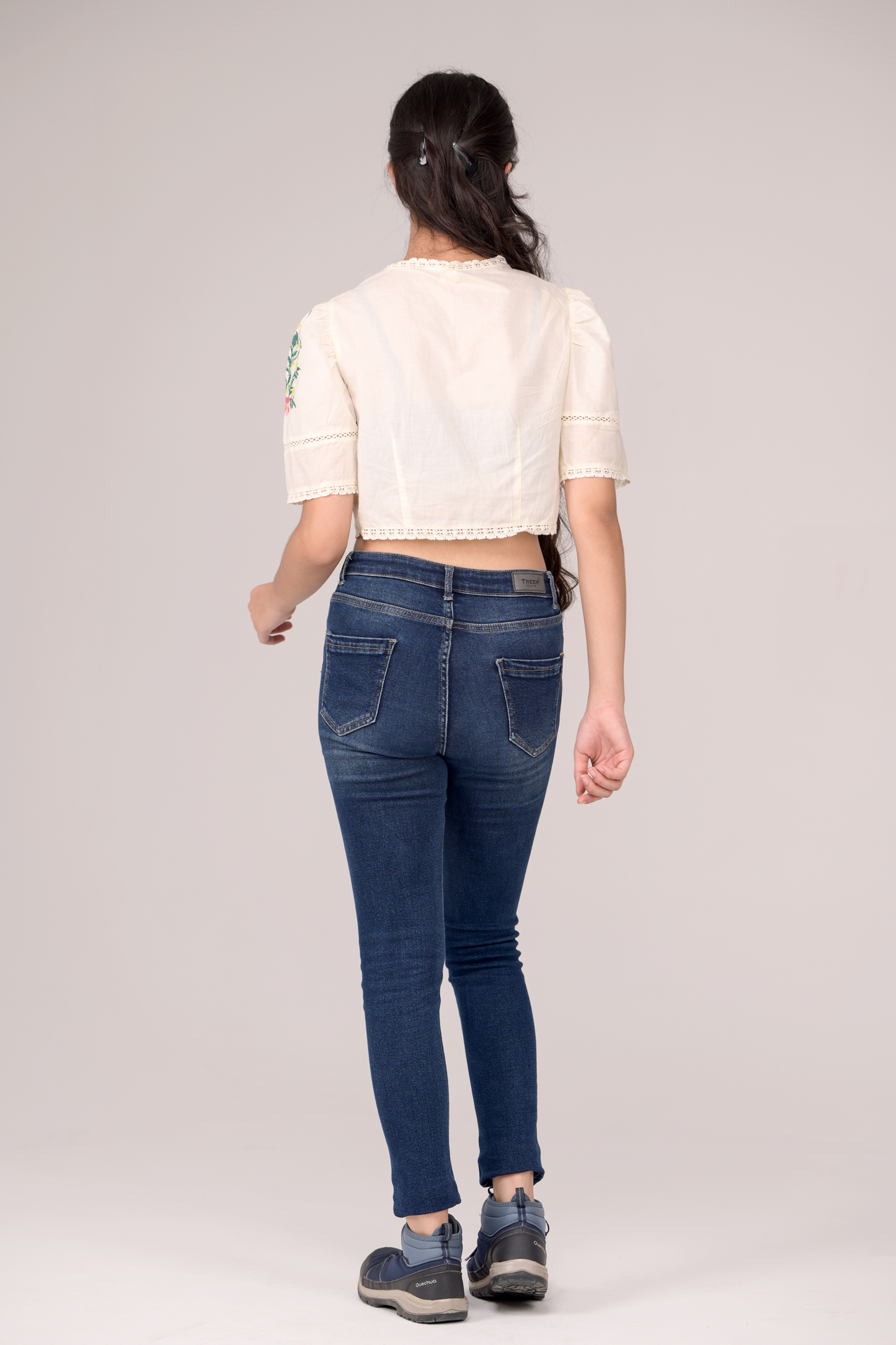 V‑neck top with embroidery details