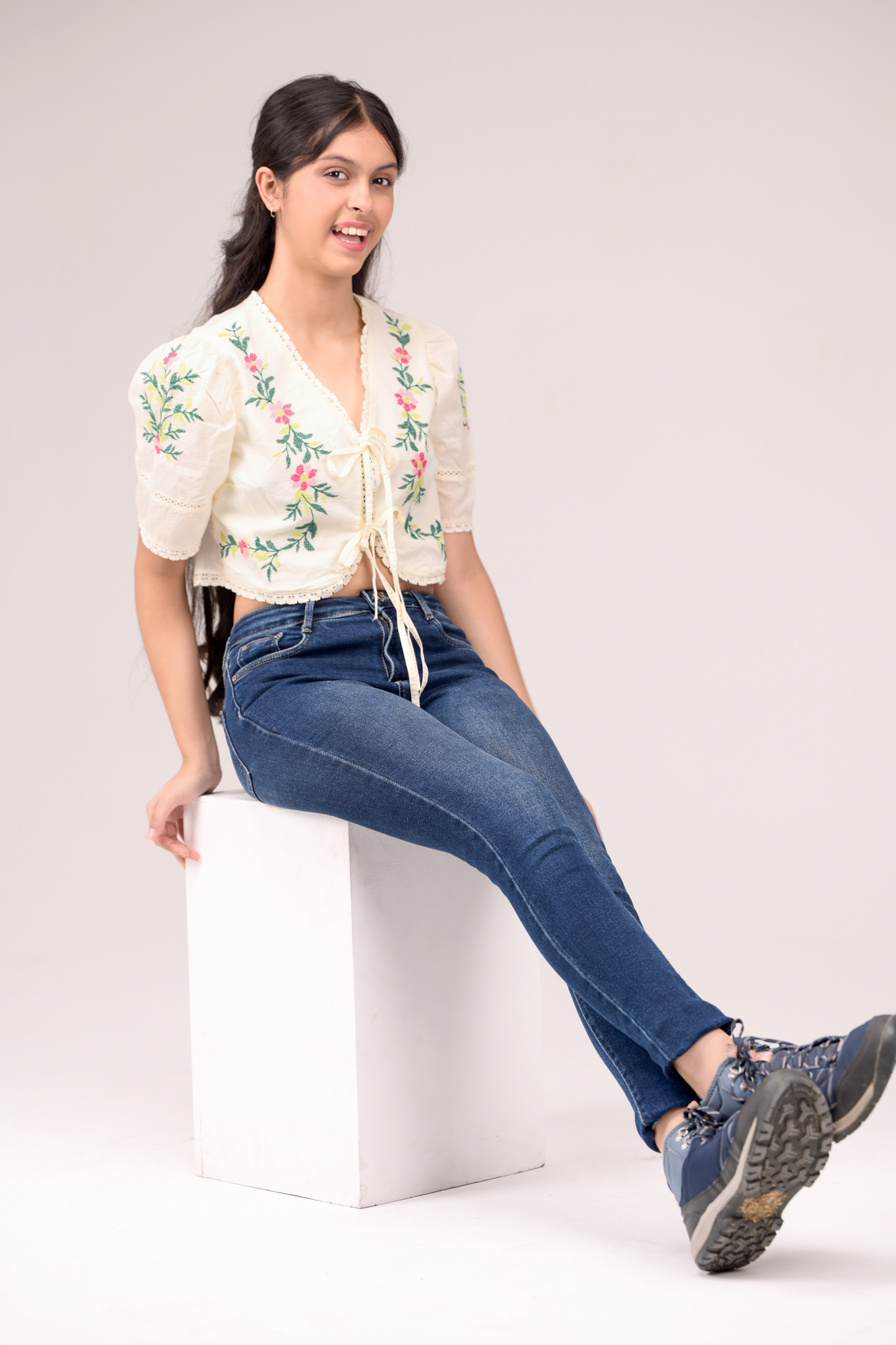 V‑neck top with embroidery details
