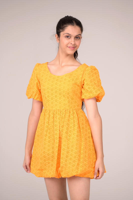 Dress with a fluttering ruffled neckline