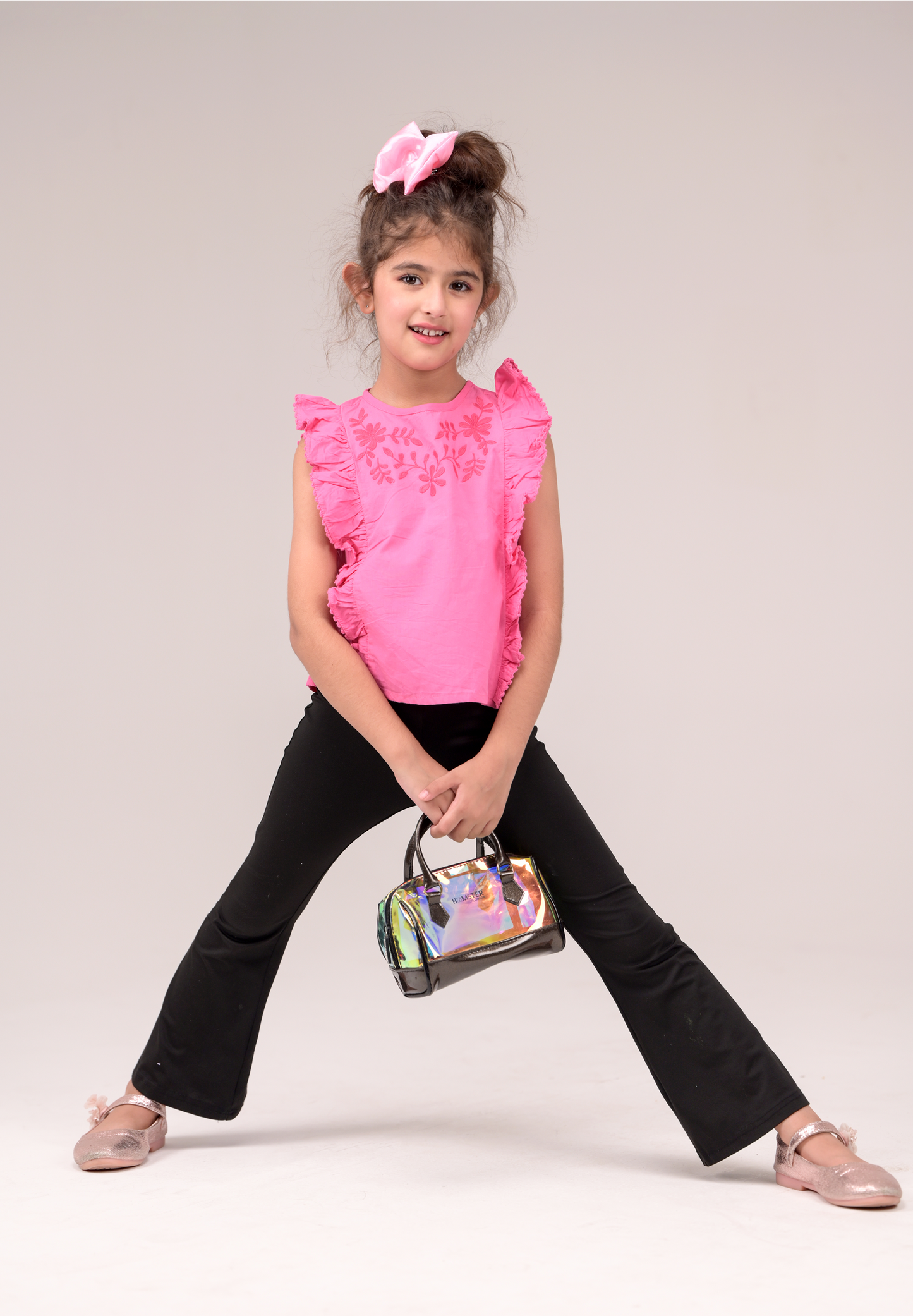 Top with elegant front embroidery and delicate lace details