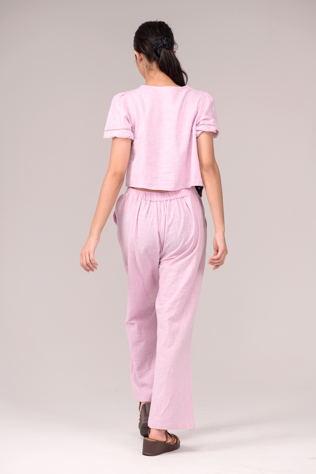 V‑neck top matched with snug waistband bottoms