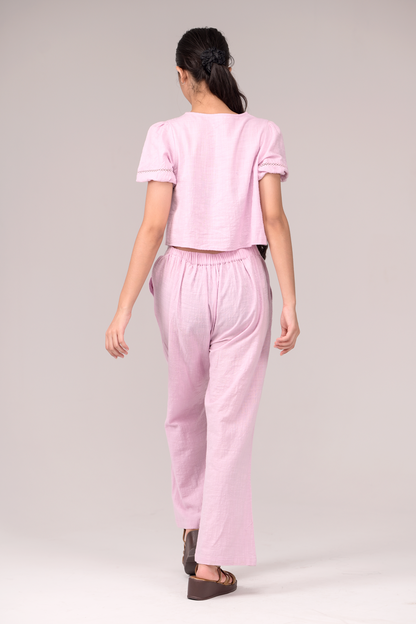 V‑neck top matched with snug waistband bottoms
