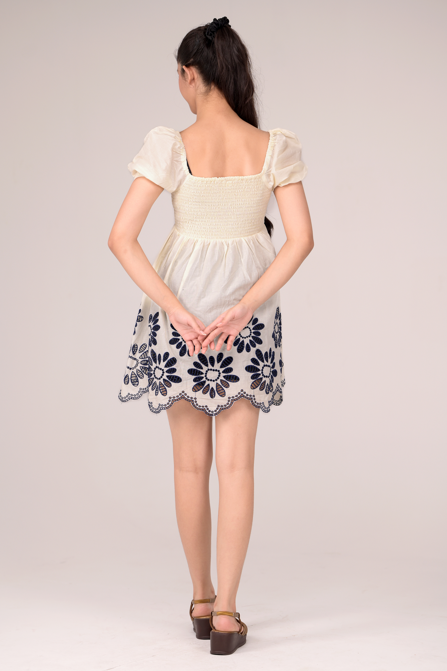 Dress with delicate embroidery blooms