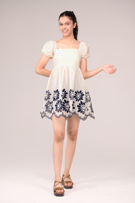 Dress with delicate embroidery blooms