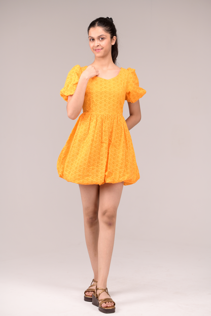 Dress with a fluttering ruffled neckline