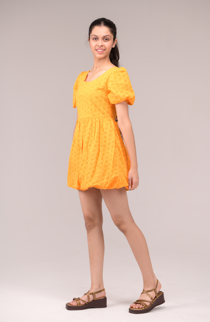 Dress with a fluttering ruffled neckline