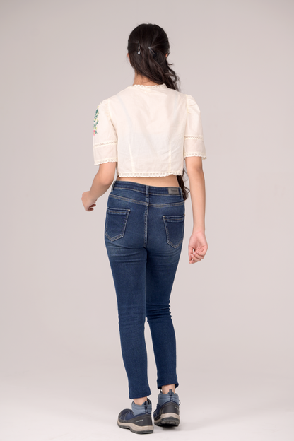 V‑neck top with embroidery details