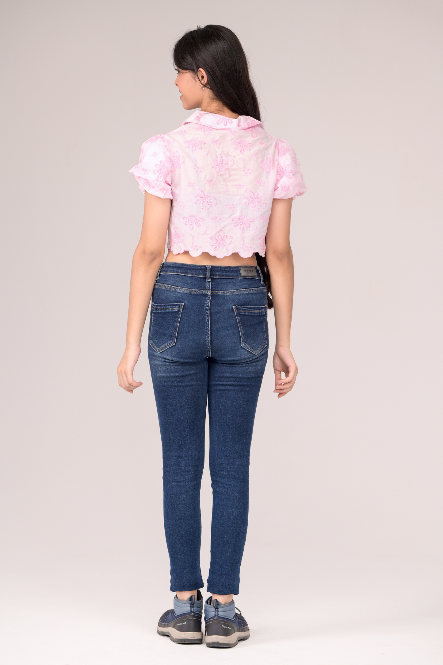 Collared top with a flirty tie knot and puff sleeves